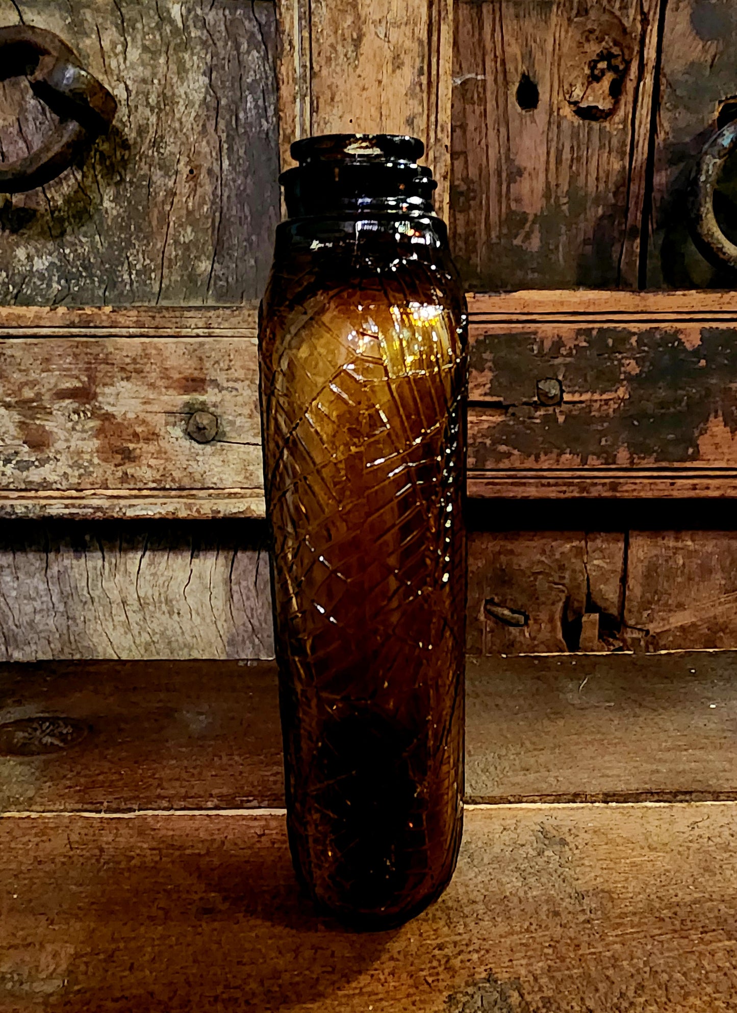 Antique Embossed Spiderweb Bottle