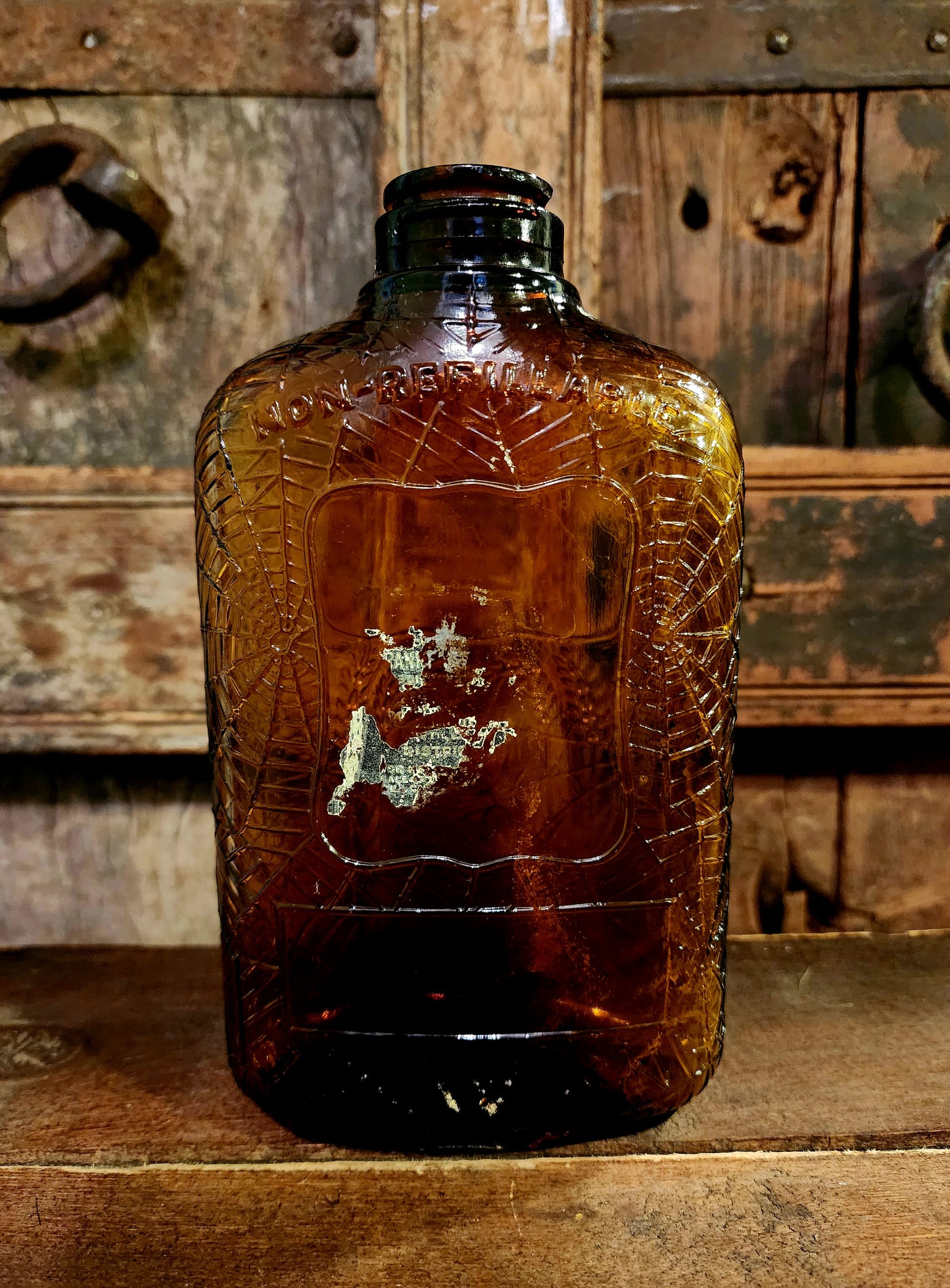 Antique Embossed Spiderweb Bottle
