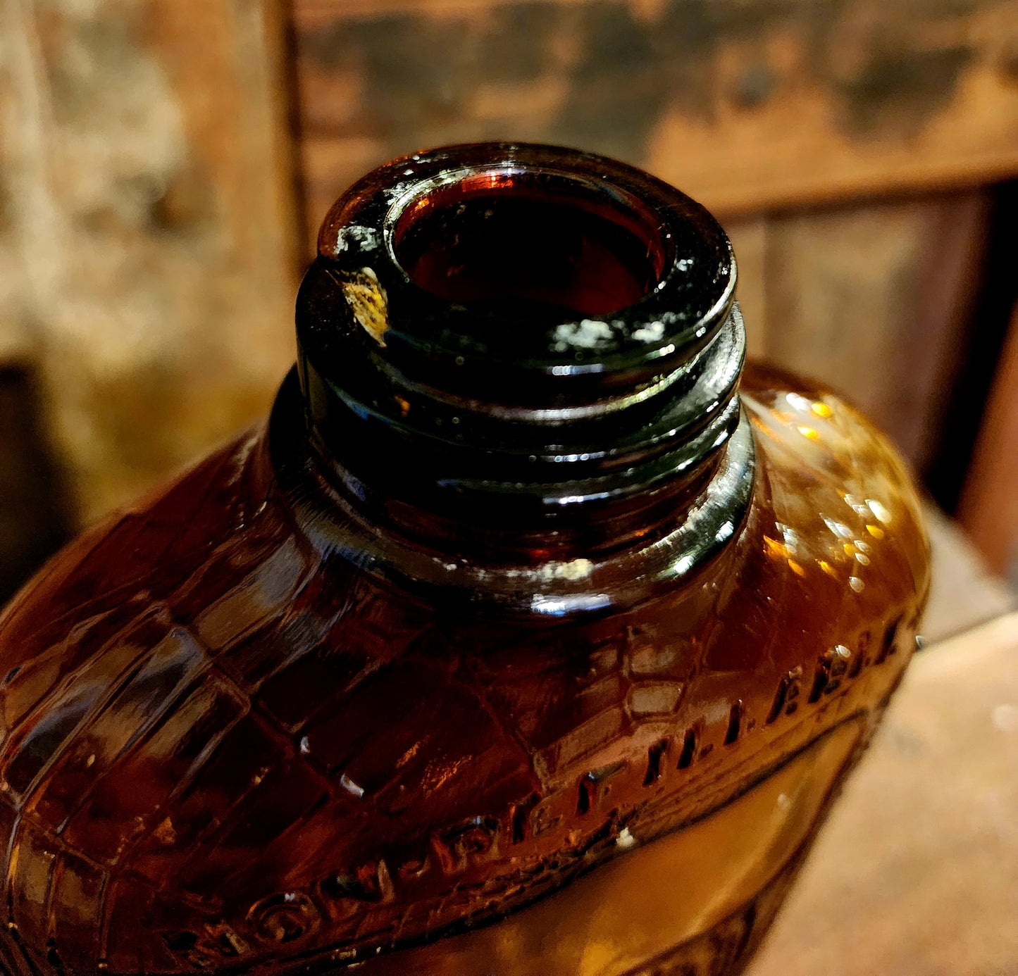 Antique Embossed Spiderweb Bottle