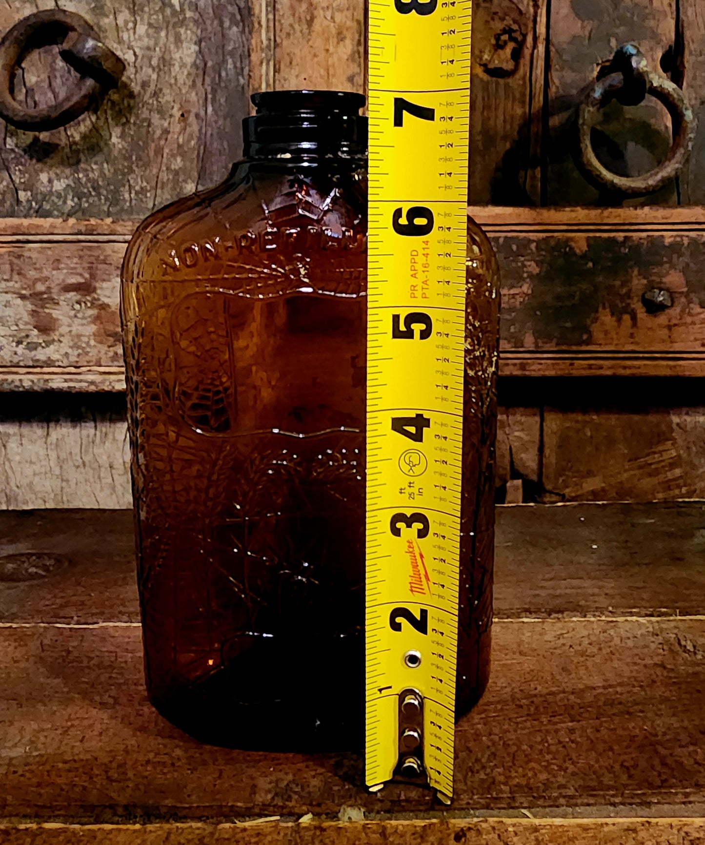 Antique Embossed Spiderweb Bottle