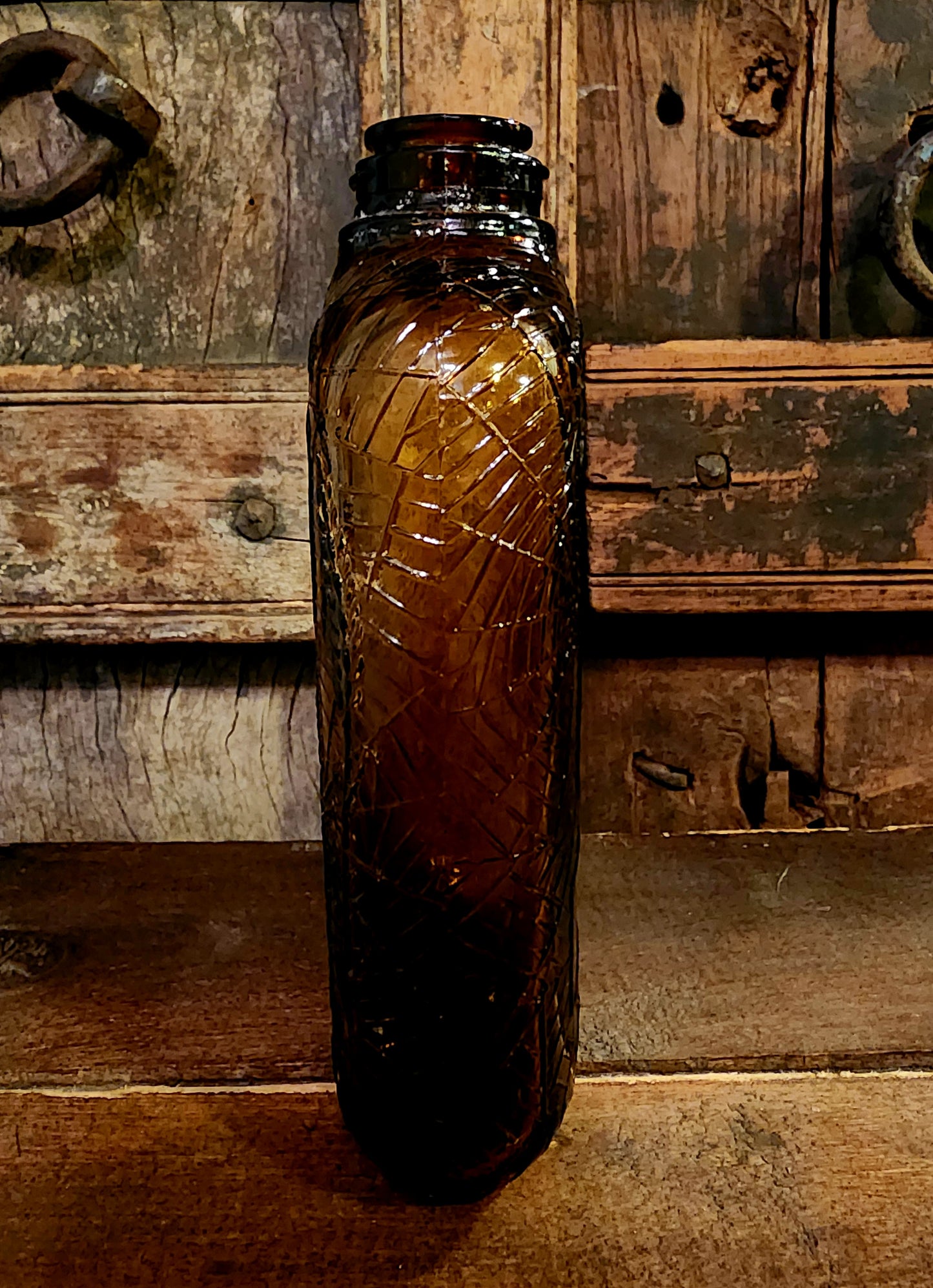 Antique Embossed Spiderweb Bottle