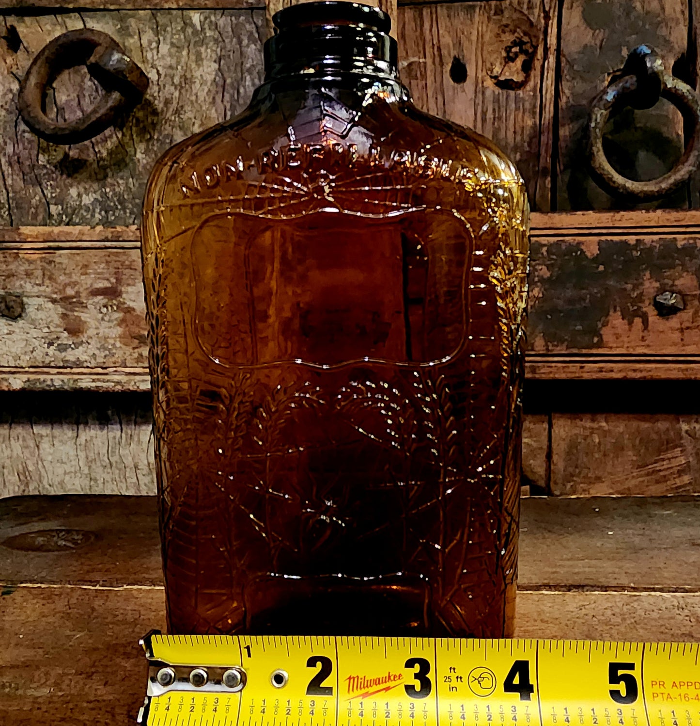 Antique Embossed Spiderweb Bottle