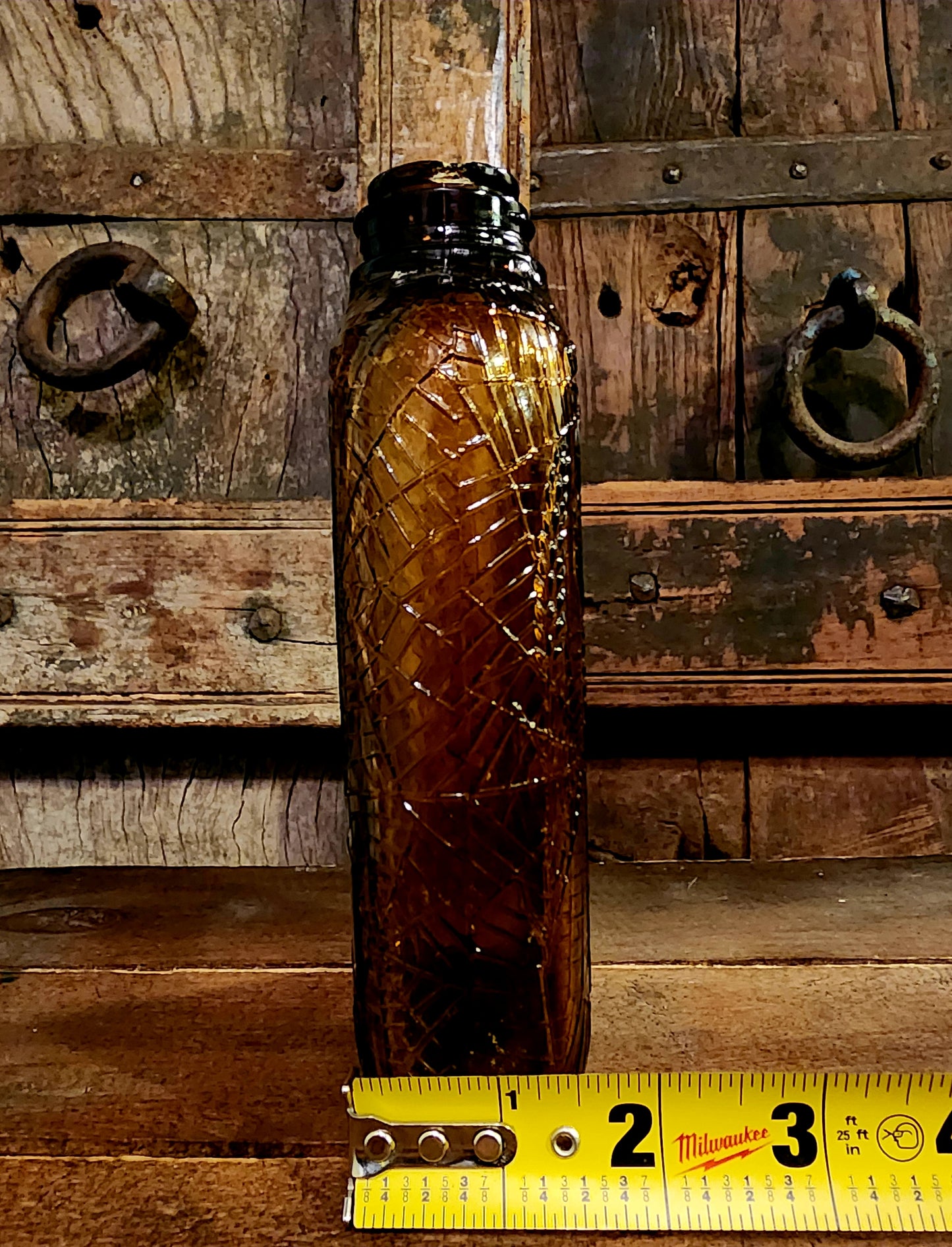 Antique Embossed Spiderweb Bottle